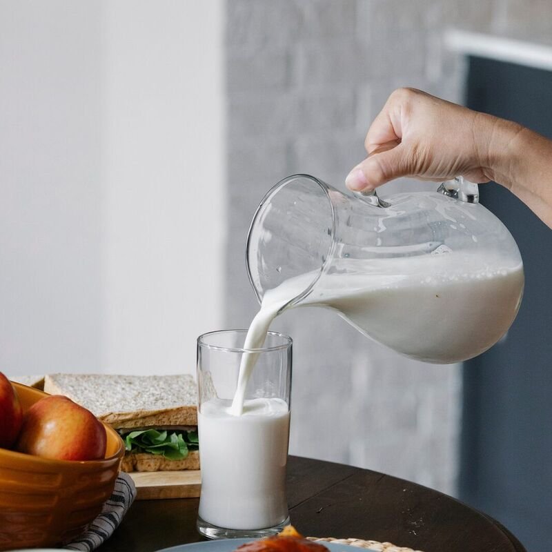 Milk being poured for breakfast