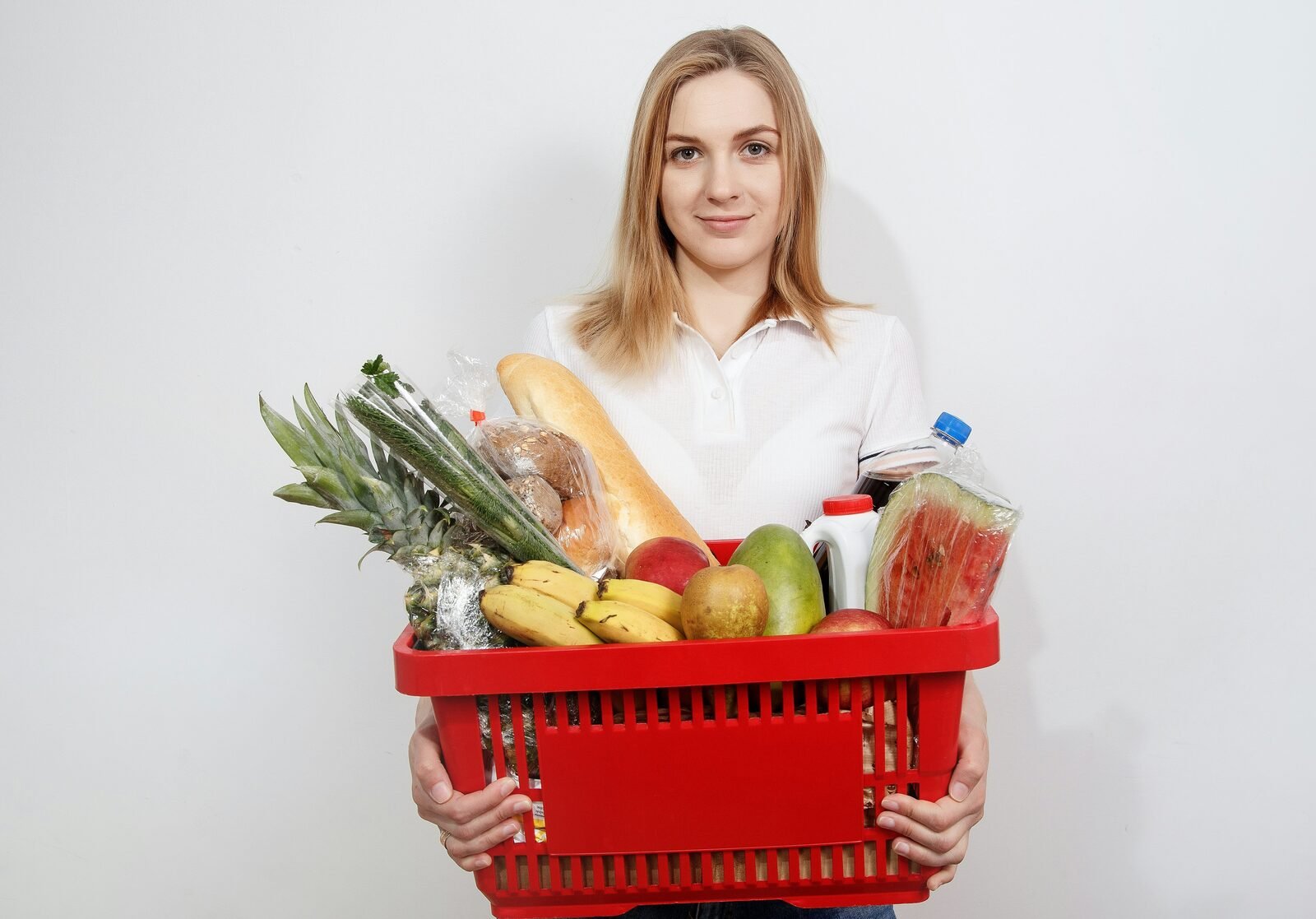 Subscriber unpacking a fresh grocery box